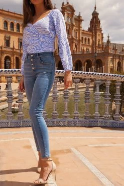 Light Wash Button Front Skinny Jeans -Classic Fashion Clothing Store 402de15a71da84411192fabadb5019c9c5e98979